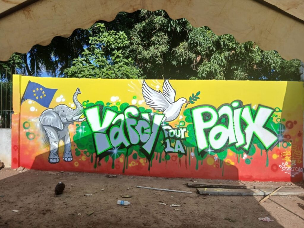 Fresque « Votez la paix » réalisée pendant la caravane